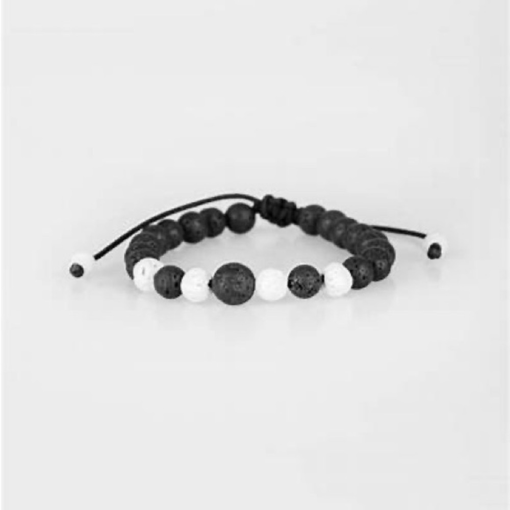 Black and white lava rocks adjustable sliding knot bracelet.
